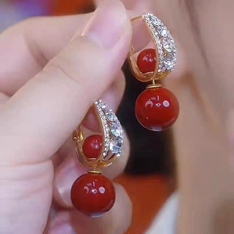 Zircon red pearl earrings